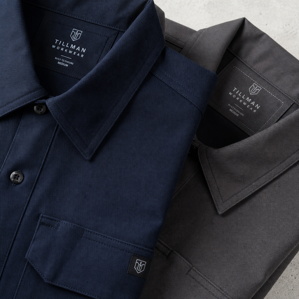 Stacked folded workwear showing fabric quality and weave detail