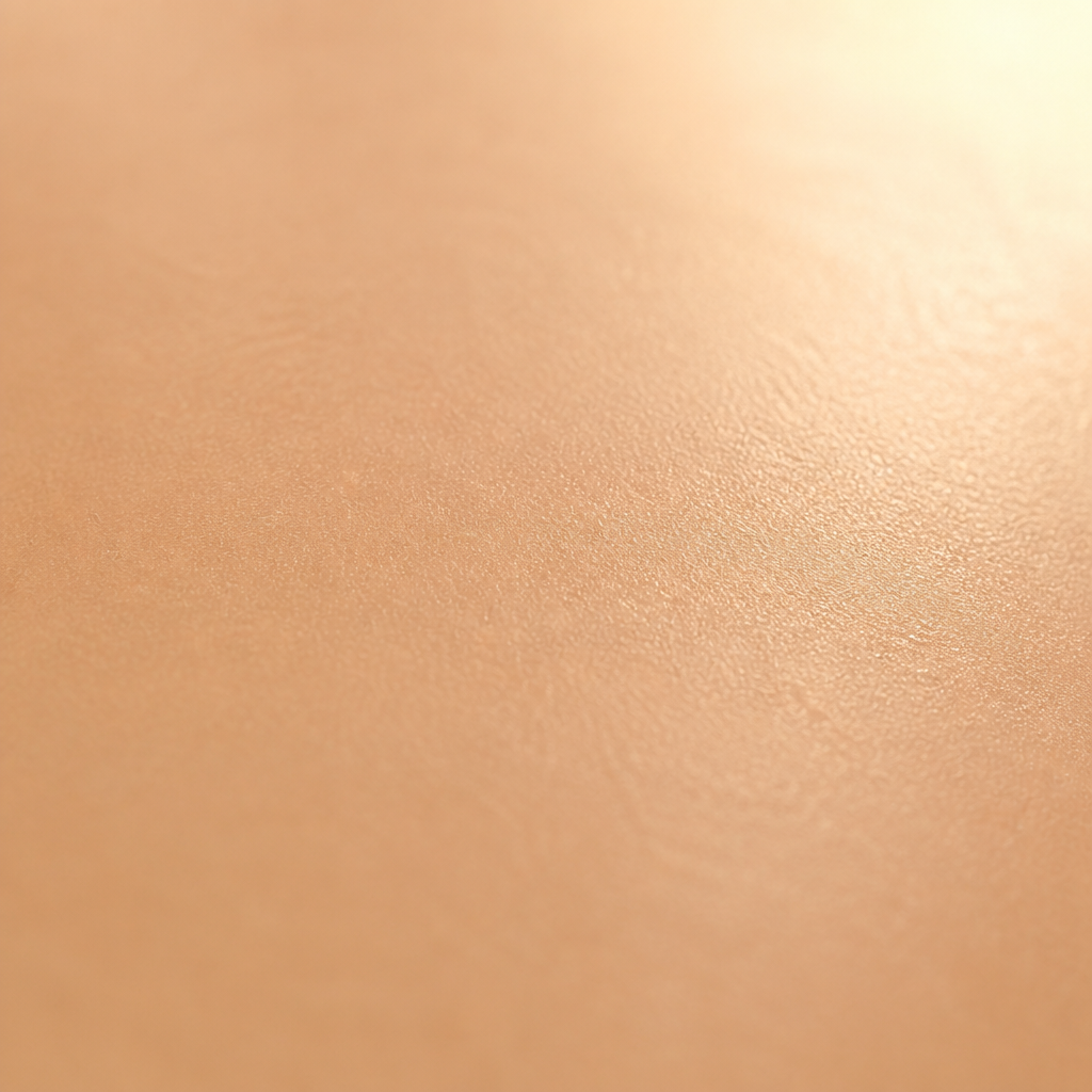 Close-up of smooth skin texture with soft clinical lighting