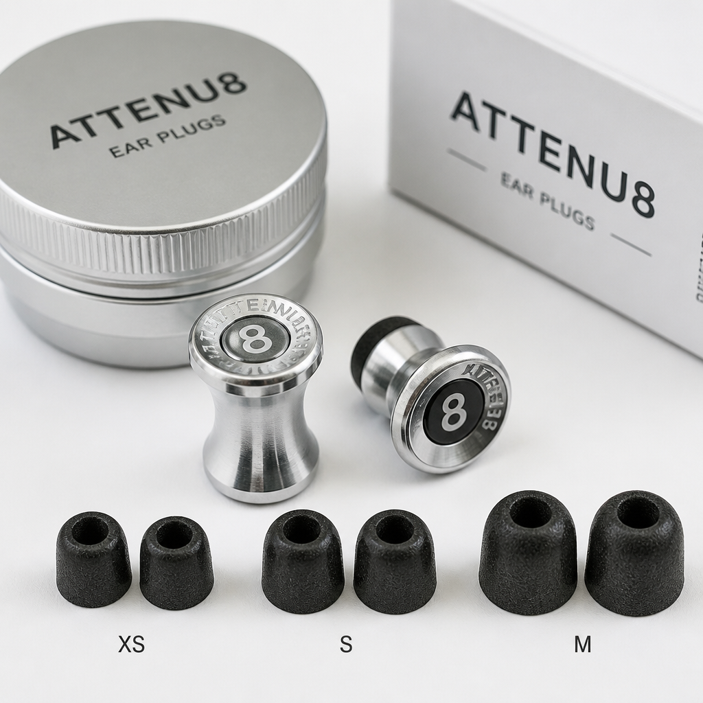 Premium ATTENU8 metal ear plugs with three sizes of memory foam tips on white background