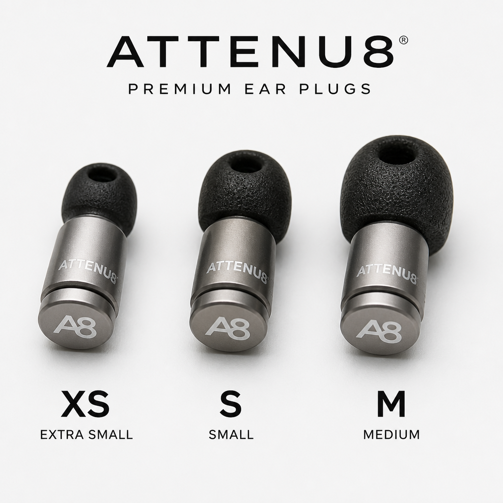 Three ATTENU8 ear plugs in XS, S, and M sizes displaying memory foam tips and metal bodies side by side